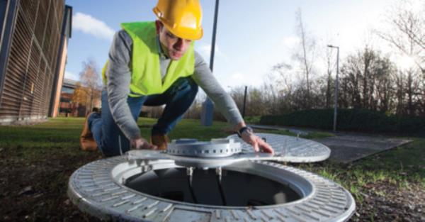 Vodafone UK’s senior networks manager Mohamed Elhabiby installing a 4G-enabled manhole and cover in Newbury, Berkshire. By connecting manhole covers to its all-fibre fully converged network, Vodafone says it can provide improved 4G coverage today as well as future 5G.